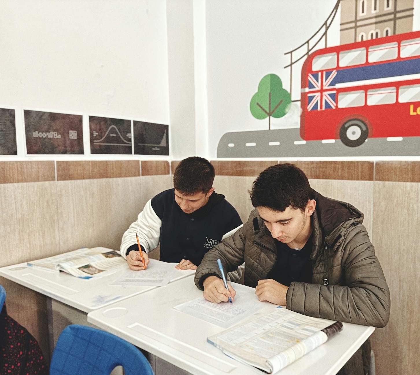 students studying in classroom with london theme