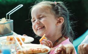 portrait of a girl eating